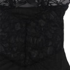 SUBBLIME - BABYDUKKEN MED JUSTERBARE STROPPER OG TRANSPARENT BLONDE BLOMSTERPRINT SORT L/XL