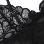 SUBBLIME - BABYDUKKEN MED JUSTERBARE STROPPER OG TRANSPARENT BLONDE BLOMSTERPRINT SORT L/XL