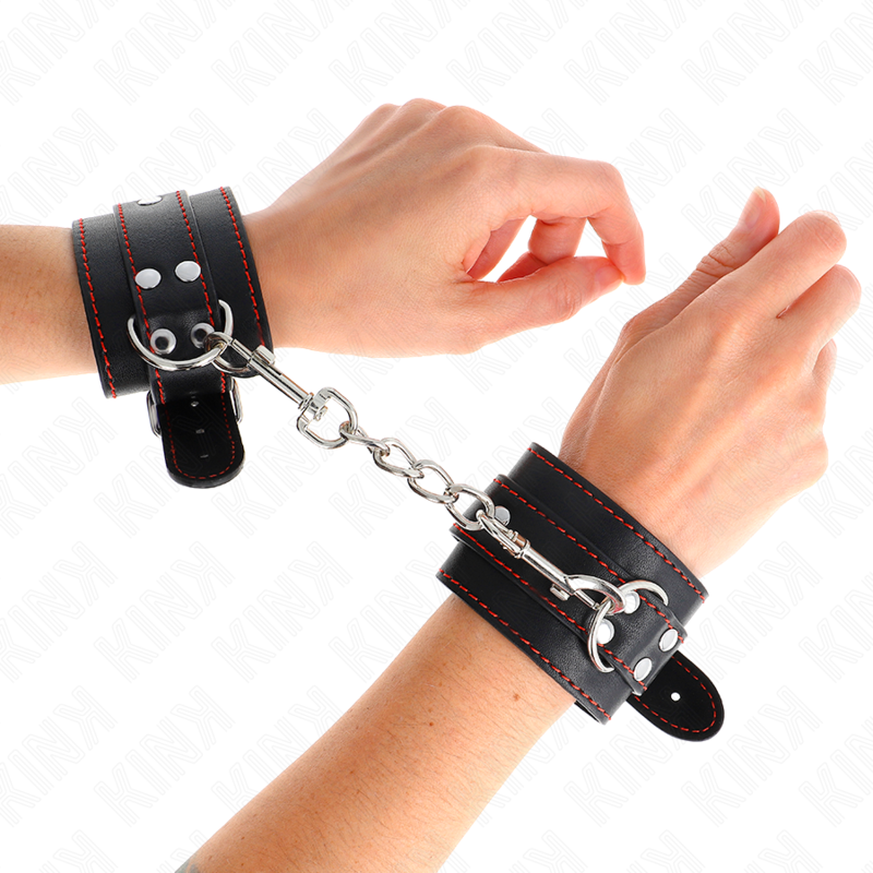 KINK - HÅNDLEDSBELØBERE SORT MED RØD FORING JUSTERBAR 20-28 CM X 5,5 CM